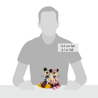 Figura de Mickey y Minnie en pijama