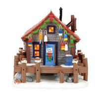 Edificio iluminado de Pete: Navidad costera