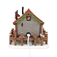 Edificio iluminado de Pete: Navidad costera