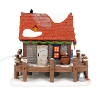 Edificio iluminado de Pete: Navidad costera