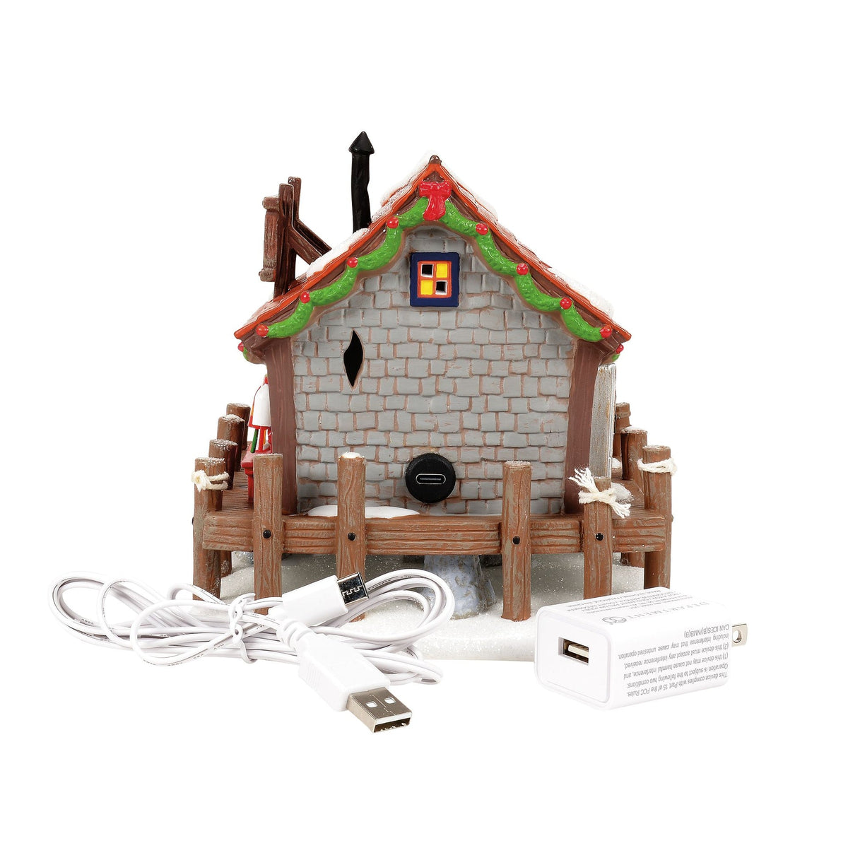 Edificio iluminado de Pete: Navidad costera