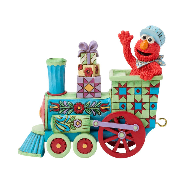 Figura de Elmo en locomotora de cumpleaños