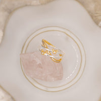 Anillo cruzado con ícono de Mickey Mouse