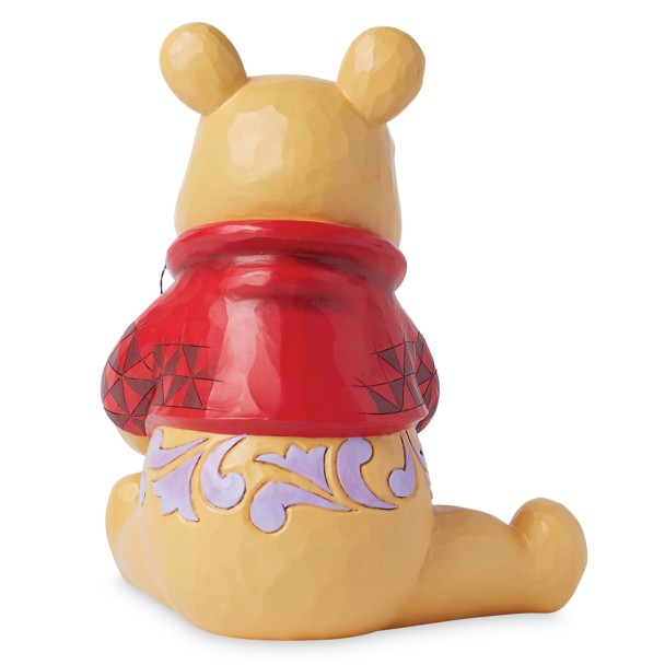 Figura de Winnie the Pooh con tarro de miel