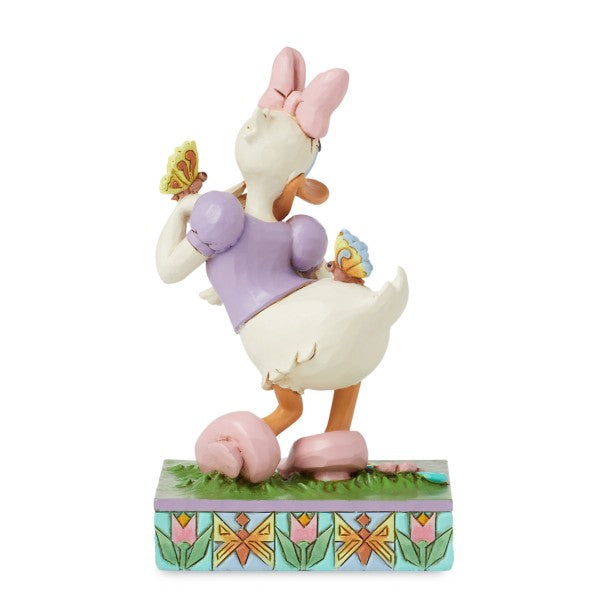 Figura de Daisy Duck «Flores y mariposas» de Jim Shore
