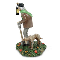 Miniatura iluminada del cuidador y su perro de The Haunted Mansion