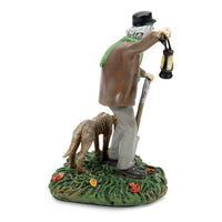 Miniatura iluminada del cuidador y su perro de The Haunted Mansion