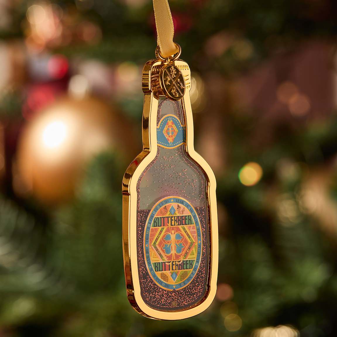 Ornamento metálico Botella de Butterbeer