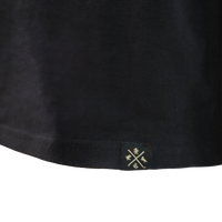 Polera negra con emblema Hufflepuff