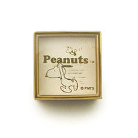Colgante Snoopy con piedra móvil color lavanda