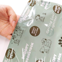 Set de 2 bolsas compresoras para ropa Snoopy M y L