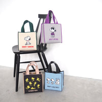 Cartera cúbica jacquard de Snoopy