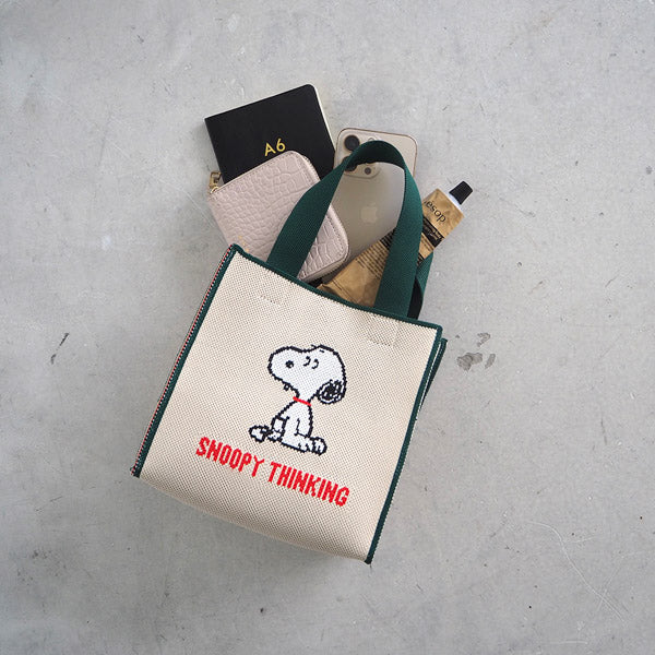 Cartera cúbica jacquard de Snoopy