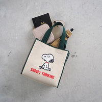 Cartera cúbica jacquard de Snoopy