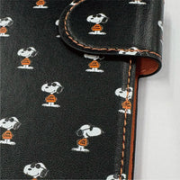 Funda tipo libro MagSafe para iPhone de Snoopy