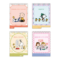 Calendario de escritorio Snoopy 2027 con mensajes