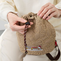 Bolso compacto acolchado de Snoopy