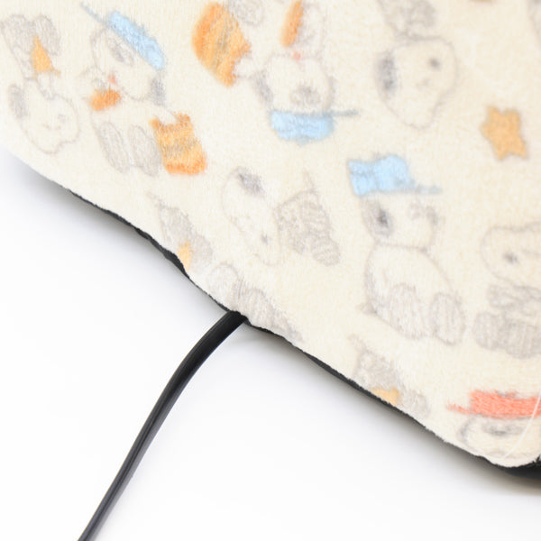 Cama tipo domo afelpada de Snoopy con diseño de galletas