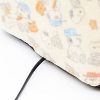 Cama tipo domo afelpada de Snoopy con diseño de galletas