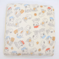 Cama tipo domo afelpada de Snoopy con diseño de galletas