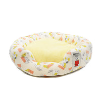 Cama redonda de Snoopy con diseño de techo rojo