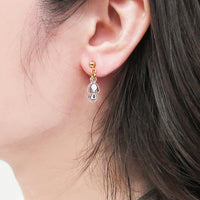 Aros colgantes de Snoopy y Belle