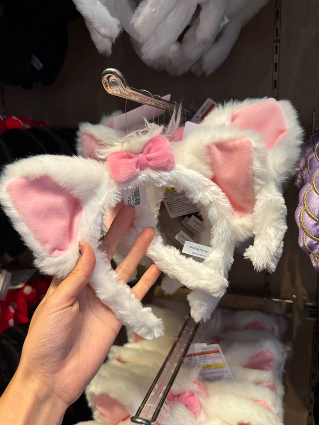 Orejas Disney Tokyo Blancas con Moño Rosado