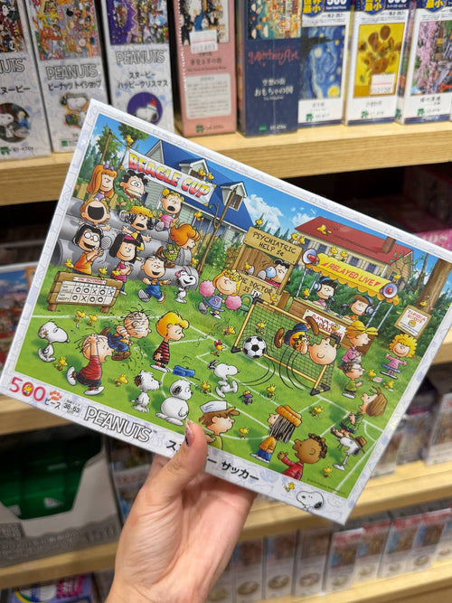 Puzzle Peanuts Partido de Fútbol 500 Piezas