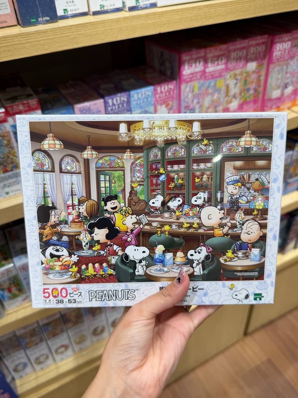 Puzzle Snoopy en Cafetería Peanuts 500 Piezas