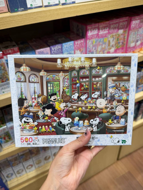 Puzzle Snoopy en Cafetería Peanuts 500 Piezas