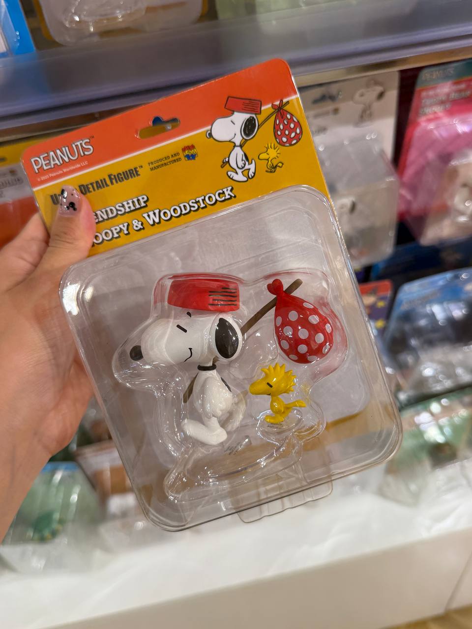 Figura Snoopy y Woodstock con Accesorio Rojo