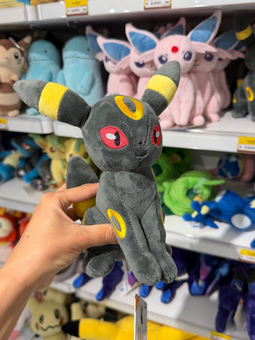 Peluche Umbreon Pokémon Gris y Amarillo