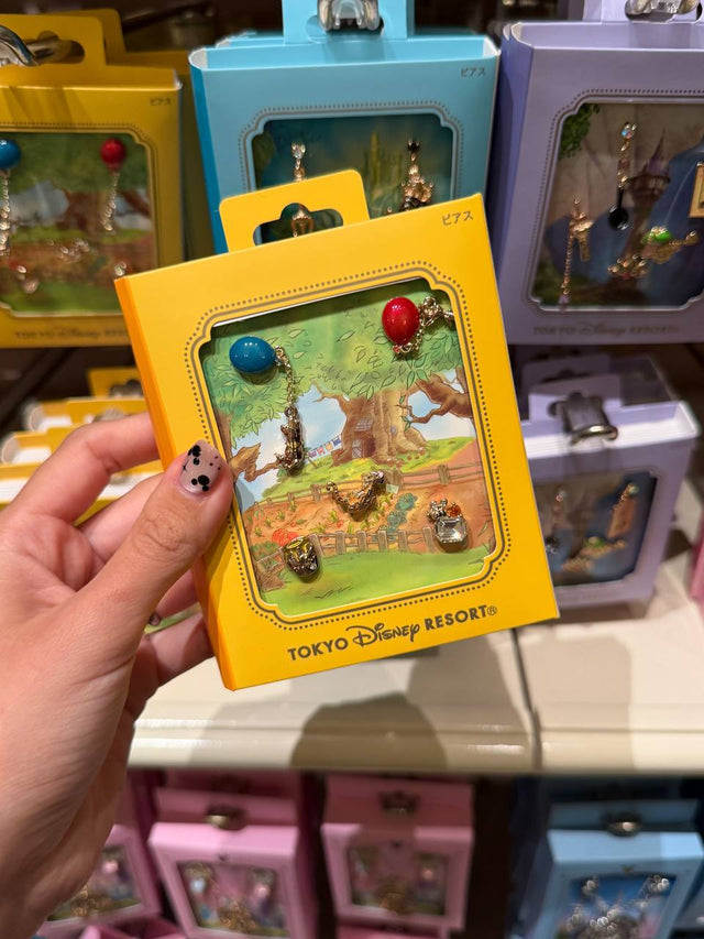 Aros Winnie con Cuentas de Colores