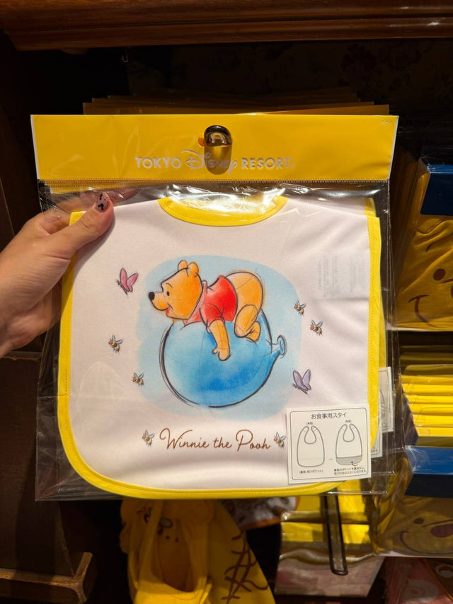 Babero Winnie Amarillo Disney