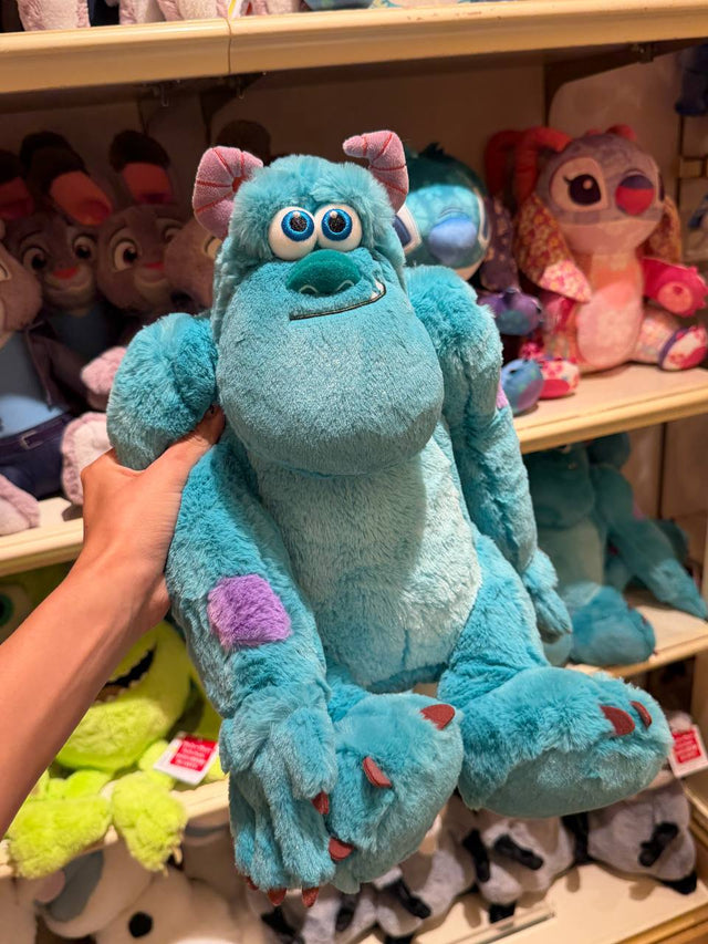 Peluche Sully Azul con Manchas Moradas