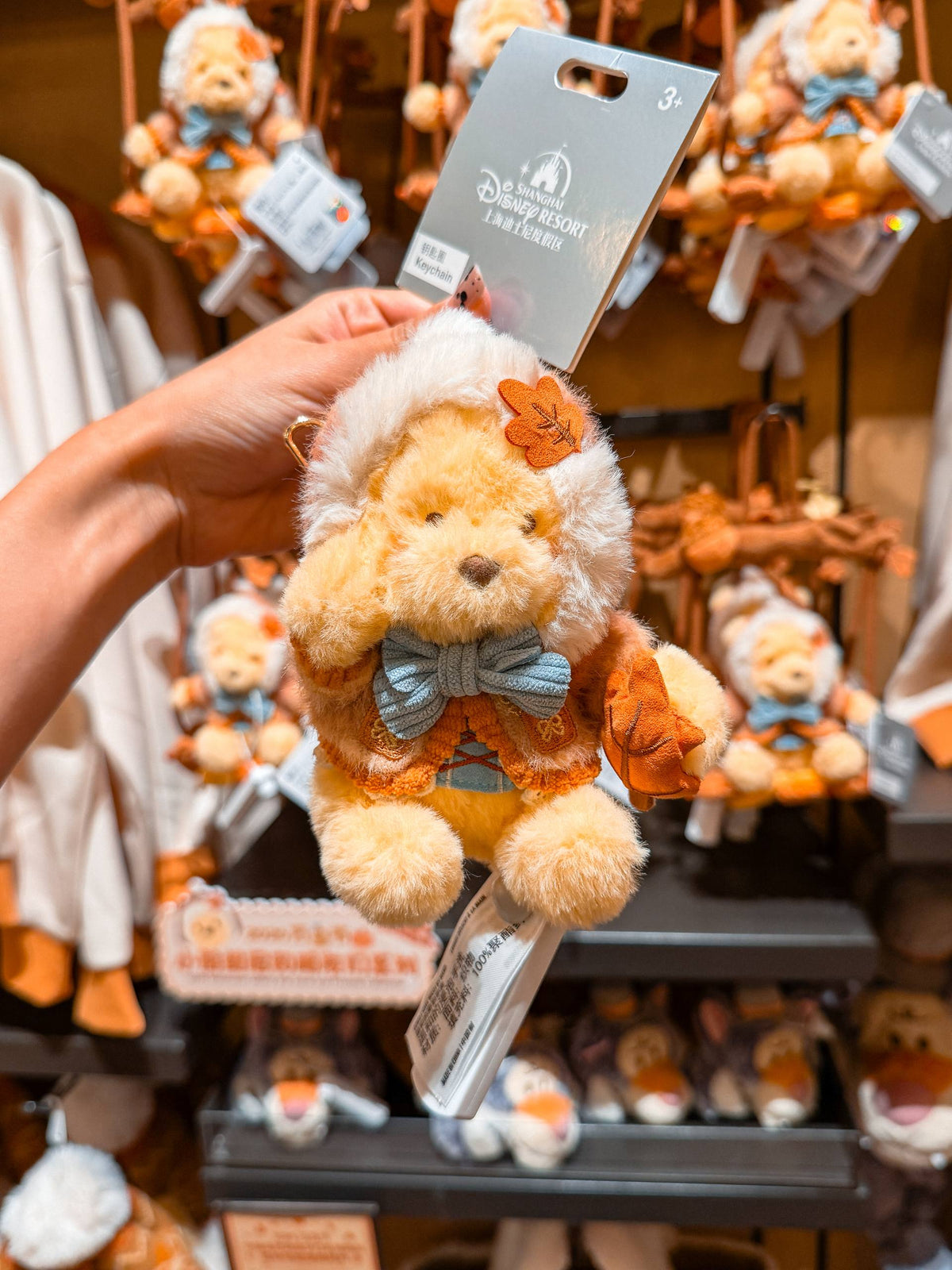 Llavero Winnie con Atuendo Naranjo