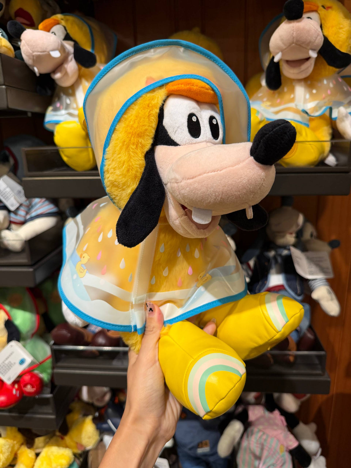 Peluche Goofy con Poncho Amarillo