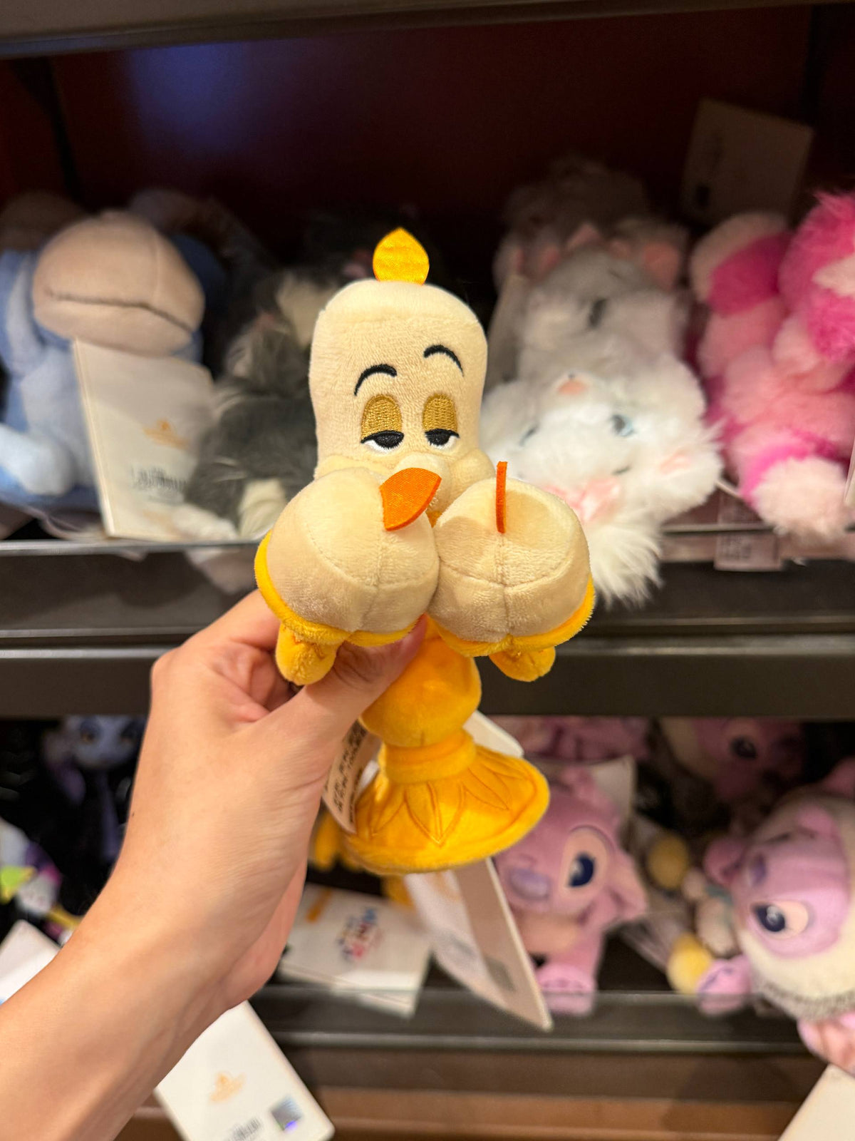 Peluche de Hombro Lumiere con Llama Naranja